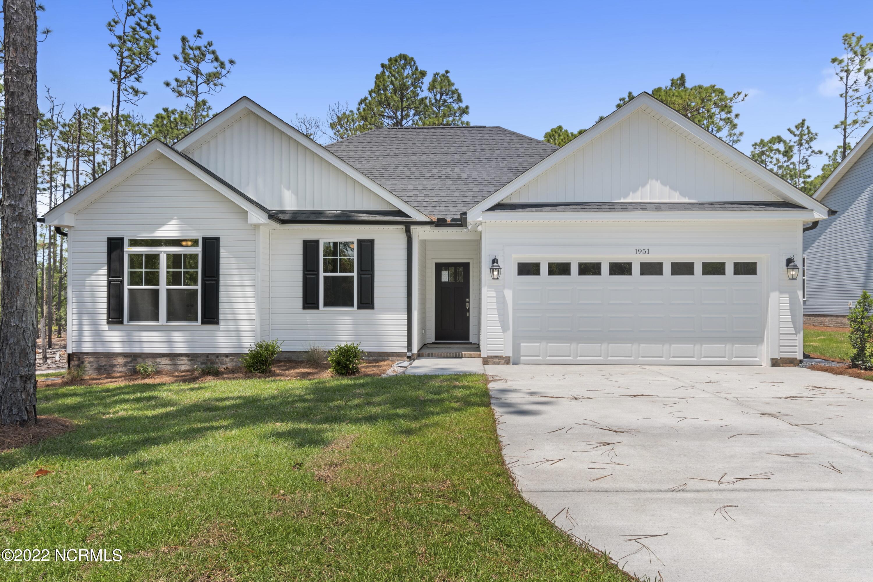 1115 East Boiling Spring Road Southport, NC 28461 - Photo 1 of 50 Previously Built Home Picture is a representation of what is to be built. Colors and finishes will vary and are subject to change.