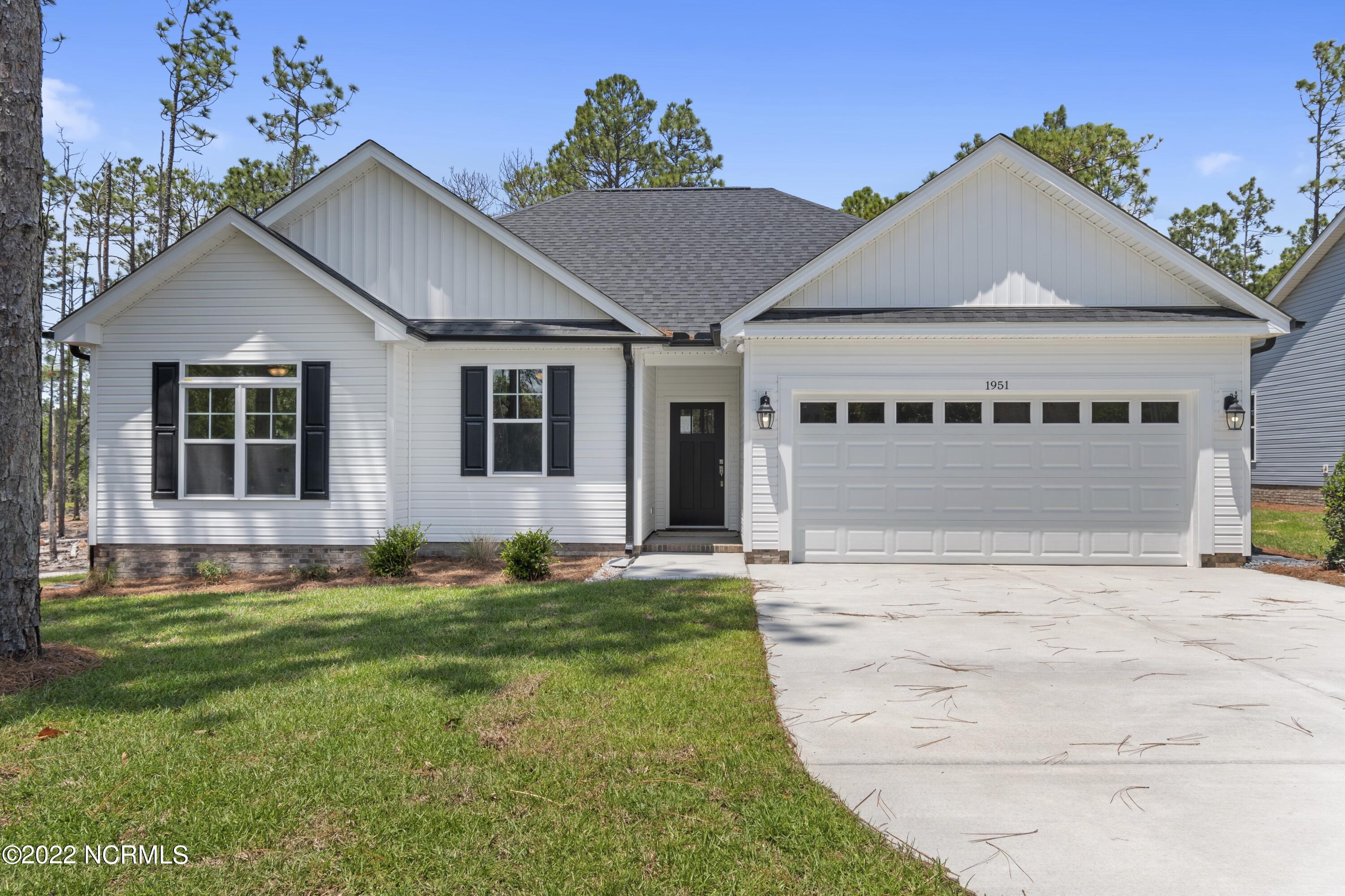 1115 East Boiling Spring Road Southport, NC 28461 - Photo 2 of 50 Previously Built Home Picture is a representation of what is to be built. Colors and finishes will vary and are subject to change.