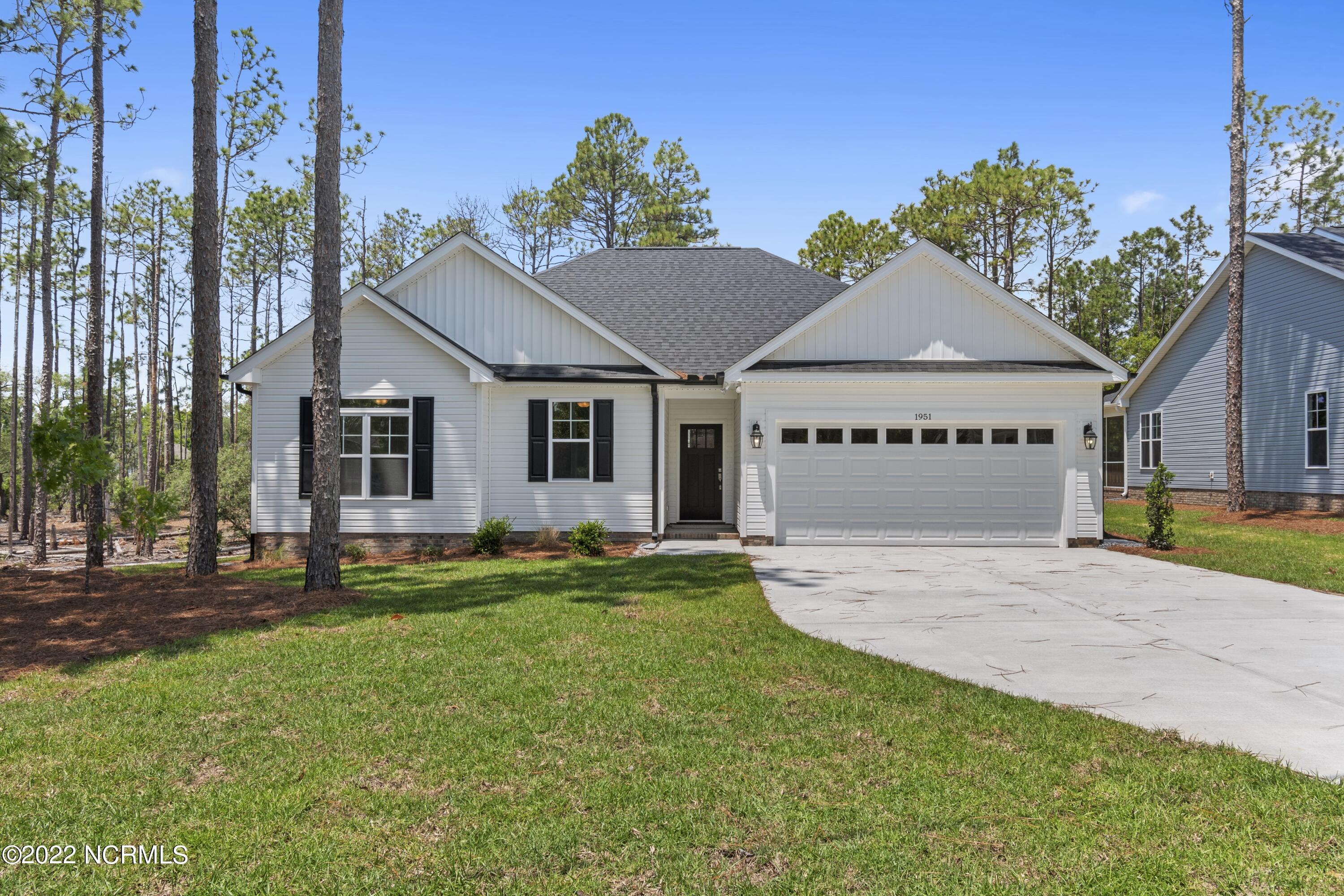 1115 East Boiling Spring Road Southport, NC 28461 - Photo 4 of 50 Previously Built Home Picture is a representation of what is to be built. Colors and finishes will vary and are subject to change.