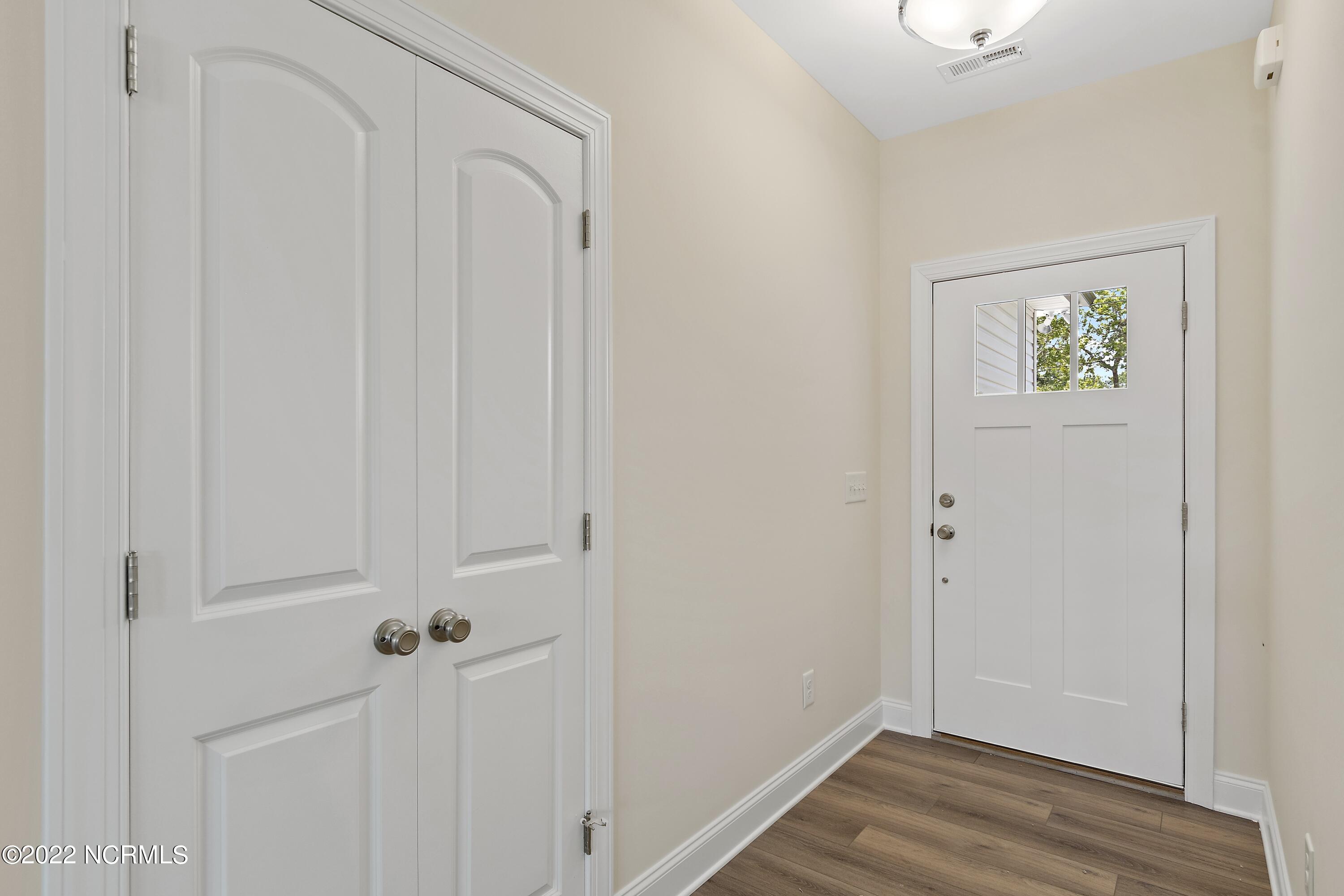 1115 East Boiling Spring Road Southport, NC 28461 - Photo 6 of 50 Previously Built Home Picture is a representation of what is to be built. Colors and finishes will vary and are subject to change.