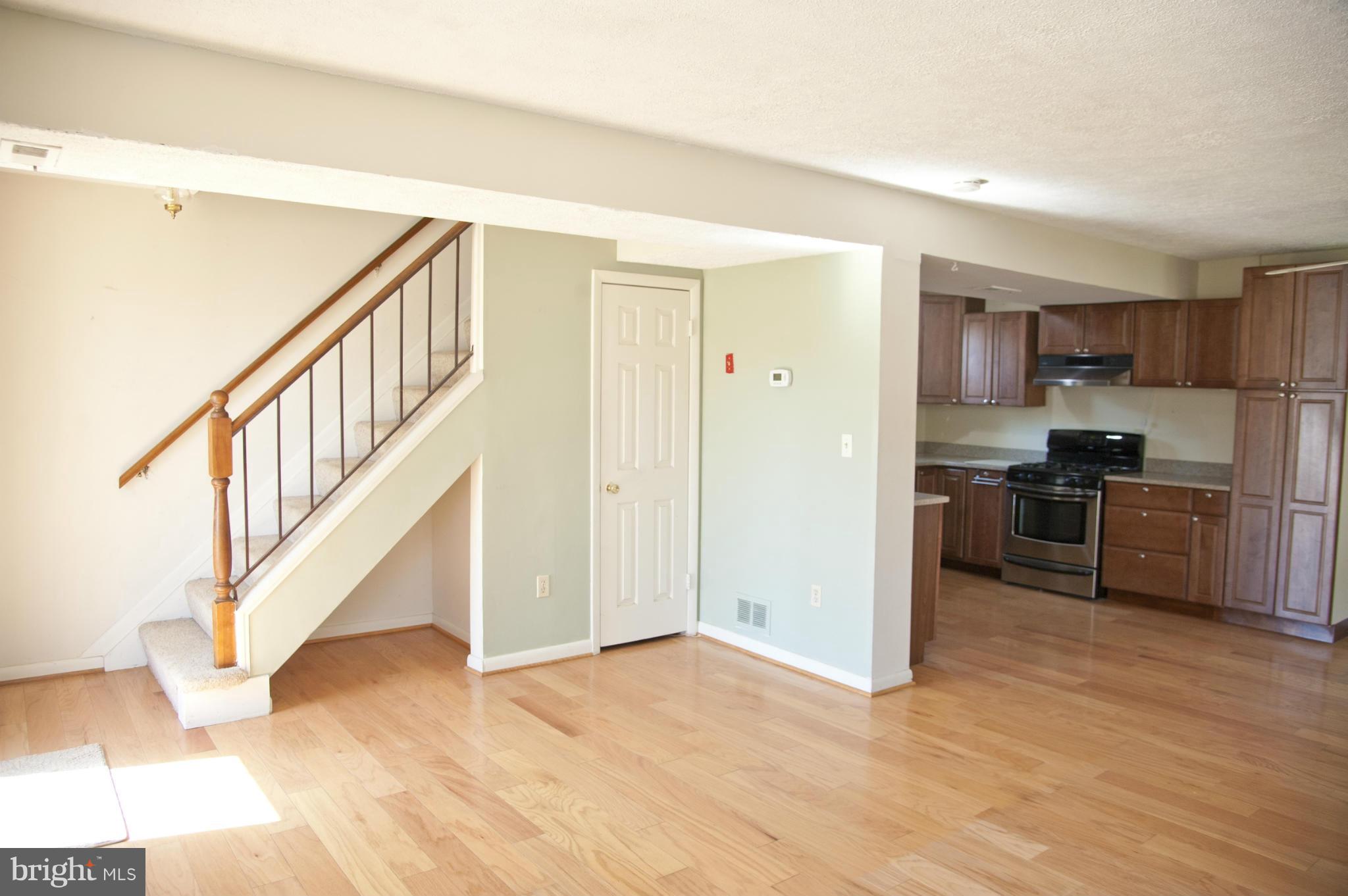 1605 Bishop Road Edgewater, MD 21037 - Photo 5 of 25 Living area and stairs to second floor