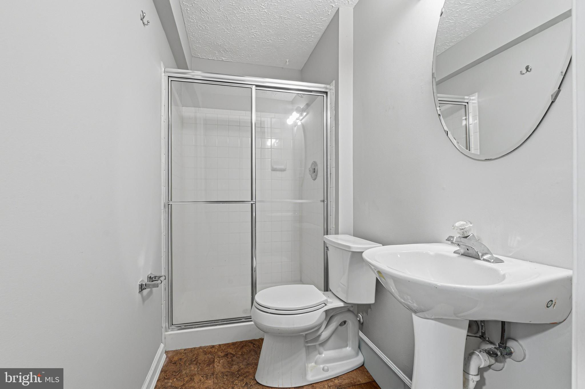 536 MacIntosh Circle Joppa, MD 21085 - Photo 20 of 32 a bathroom with a sink a toilet and shower