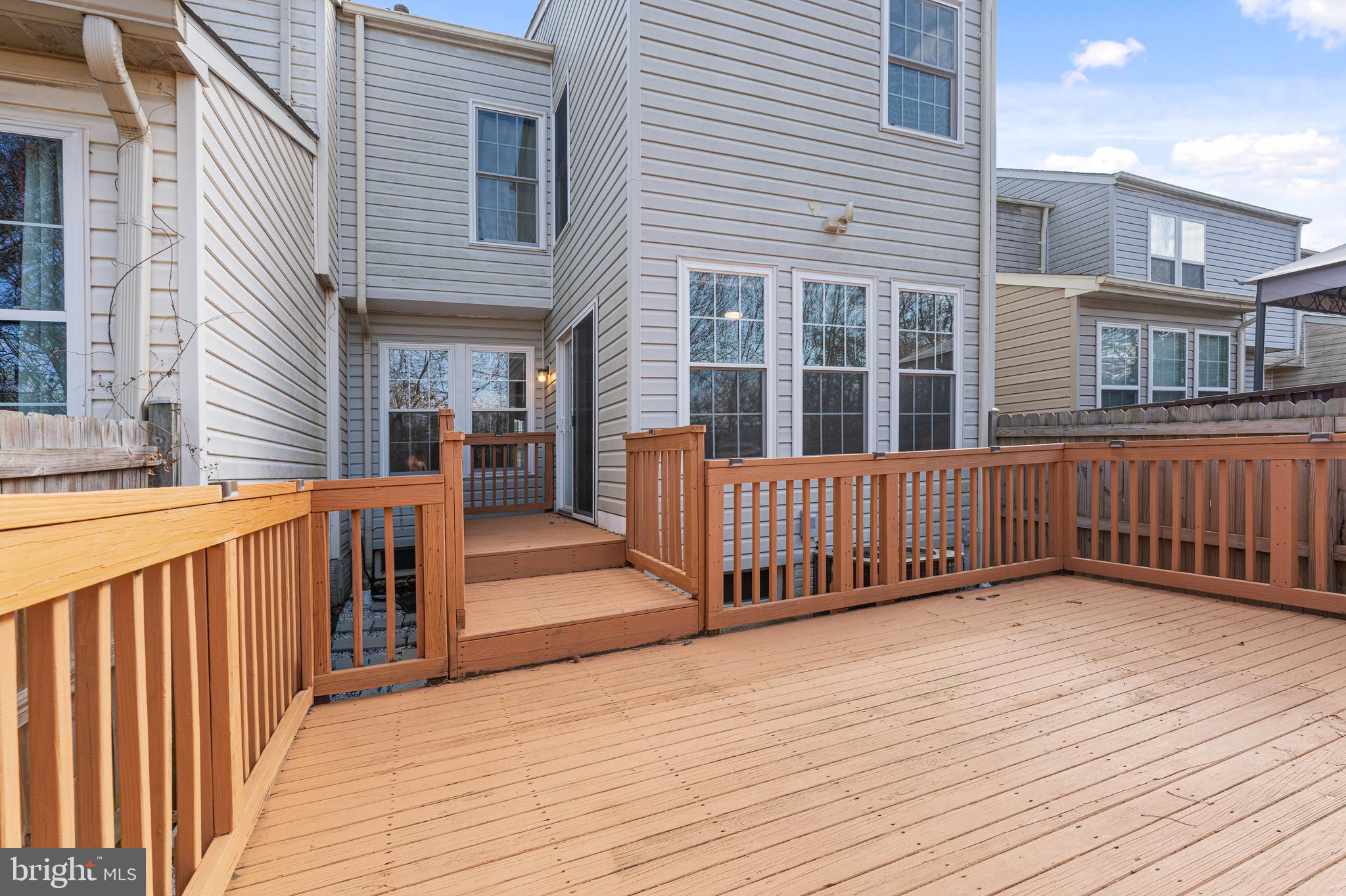 536 MacIntosh Circle Joppa, MD 21085 - Photo 21 of 32 a view of a deck with wooden floor and fence