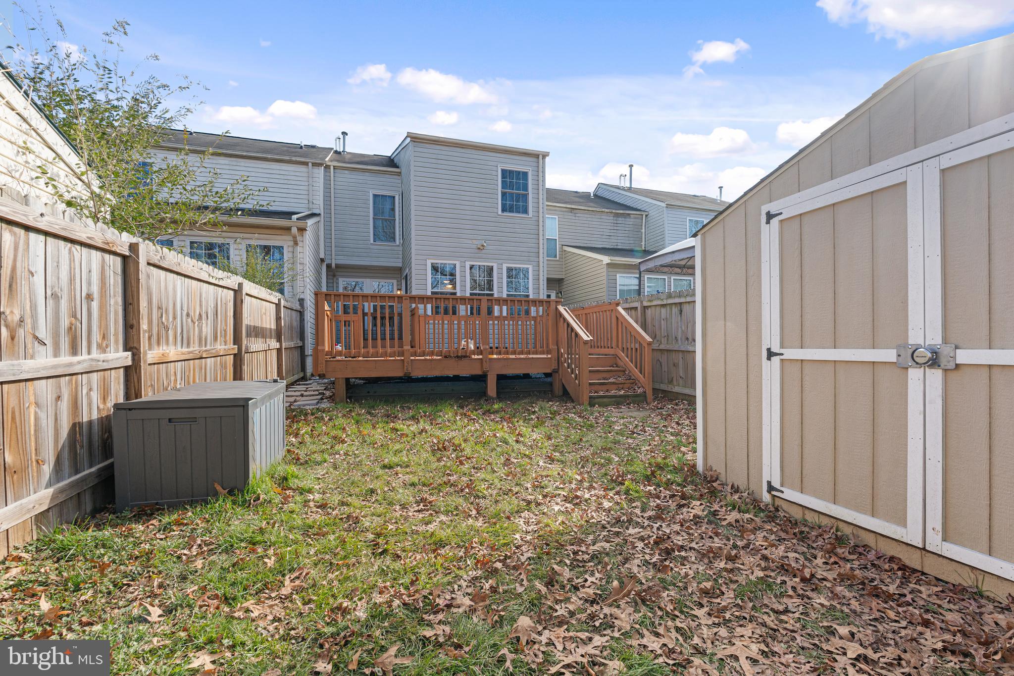 536 MacIntosh Circle Joppa, MD 21085 - Photo 24 of 32 a view of backyard with tub and seating area