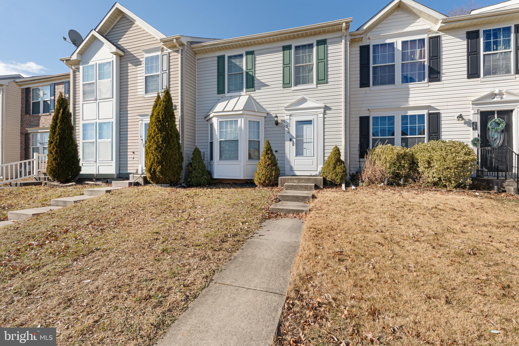 536 MacIntosh Circle Joppa, MD 21085 - Photo 26 of 32 a front view of a house with a yard