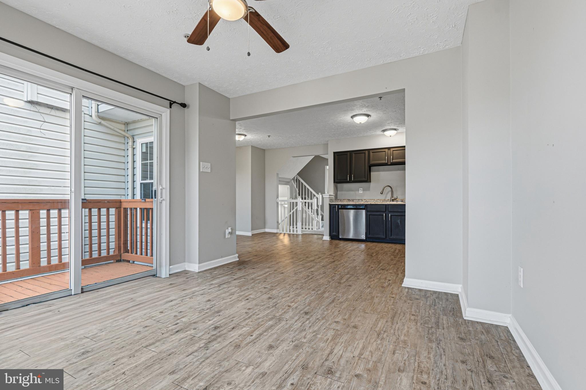 536 MacIntosh Circle Joppa, MD 21085 - Photo 6 of 32 wooden floor in an empty room with a window