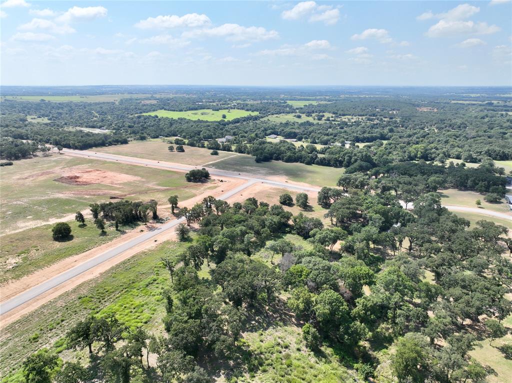 Lot 46 Colt Road Springtown, TX 76082 - Photo 9 of 14 an aerial view of residential houses with outdoor space