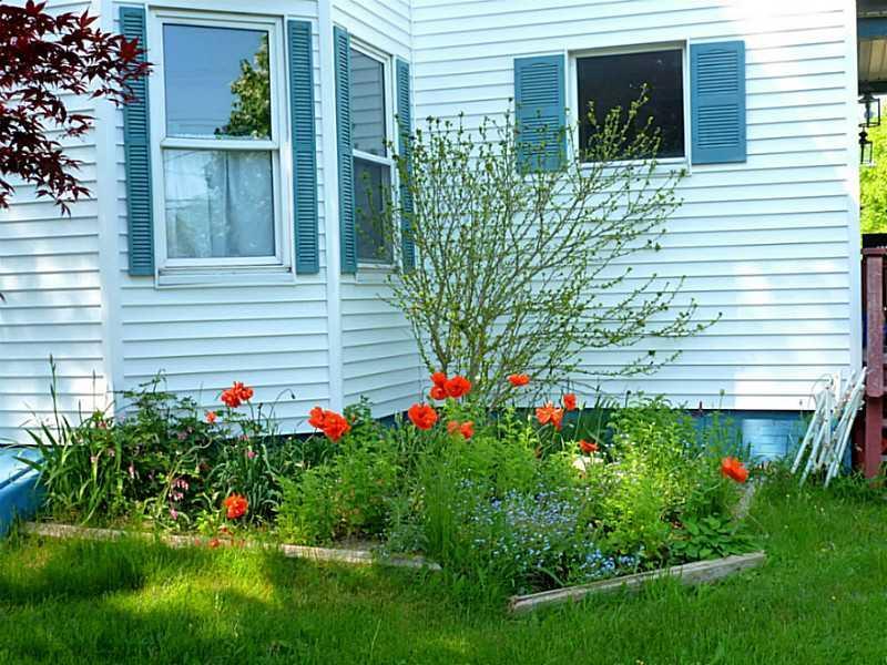1746 Harpswell Islands Road Orrs Island, ME 04066 - Photo 3 of 33 Yard/Garden. surrounded by perennials