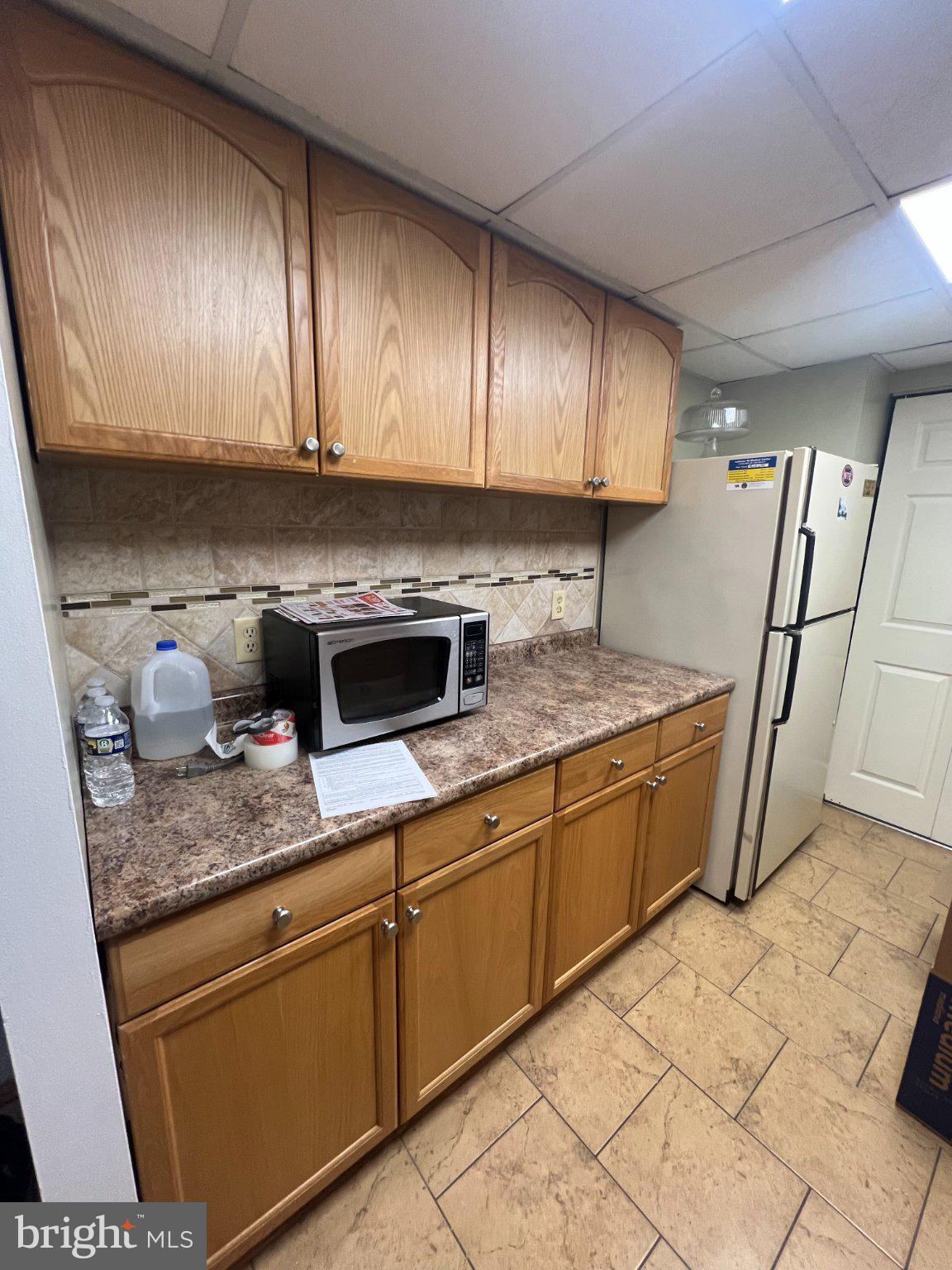 2904 State Hill Road, Unit F9 Reading, PA 19610 - Photo 11 of 30 Cozy kitchen with warm wood accents.