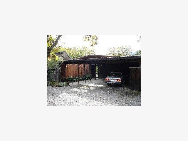 4668 Alpine Road Portola Valley, CA 94028 - Photo 3 of 9 a picture of a bench in front of a building