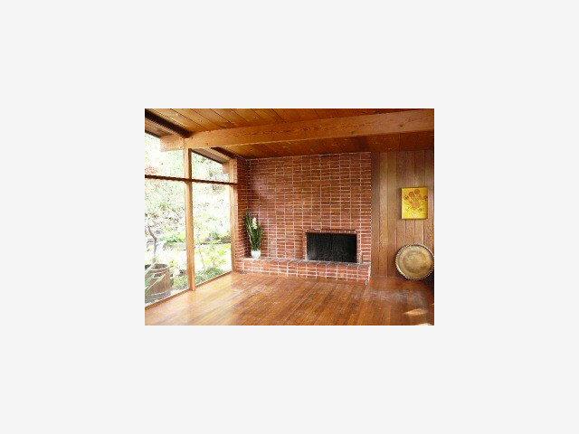 4668 Alpine Road Portola Valley, CA 94028 - Photo 7 of 9 a view of livingroom with fireplace