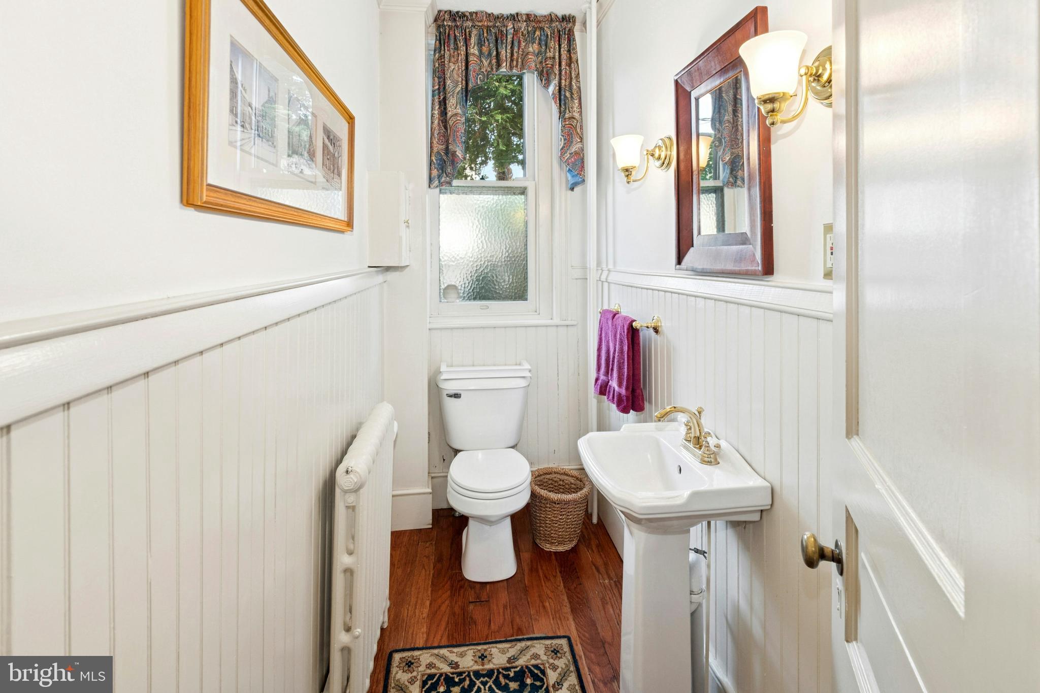 72-74 West Market Street Bethlehem, PA 18018 - Photo 15 of 36 a bathroom with a sink toilet and shower