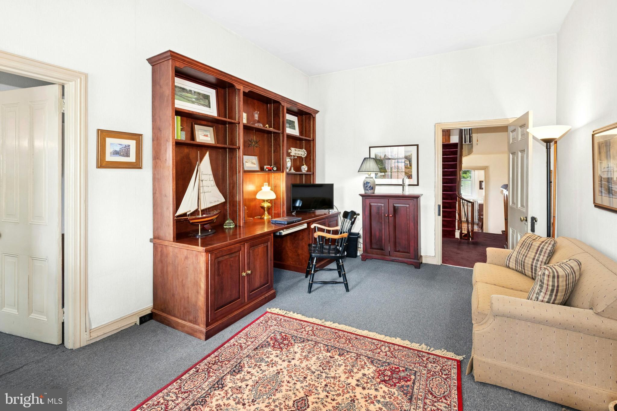 72-74 West Market Street Bethlehem, PA 18018 - Photo 17 of 36 a living room with furniture and a piano