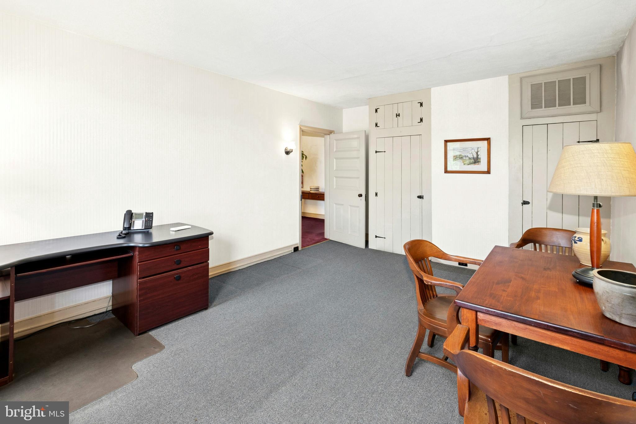 72-74 West Market Street Bethlehem, PA 18018 - Photo 30 of 36 a room with furniture and a lamp on a dresser