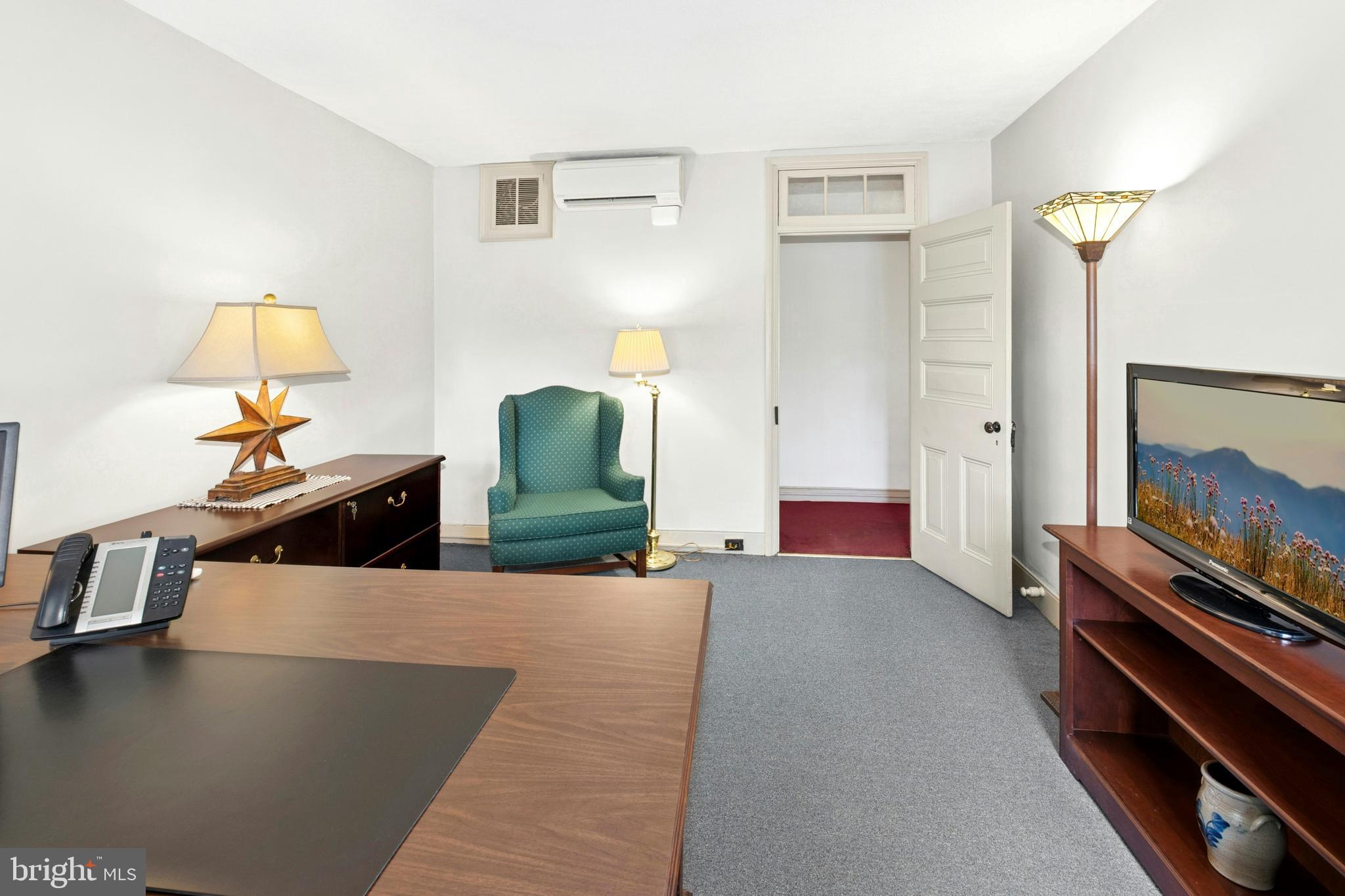 72-74 West Market Street Bethlehem, PA 18018 - Photo 31 of 36 a living room with furniture and a flat screen tv