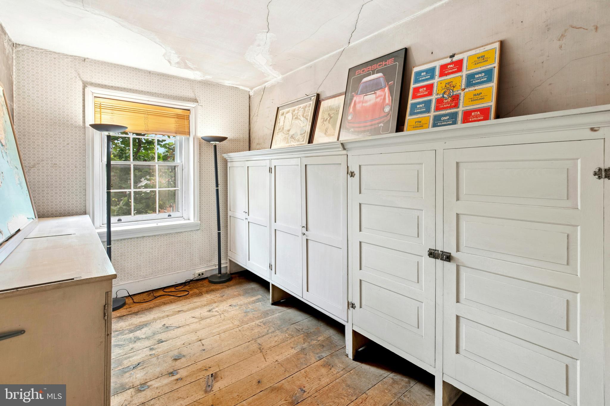 72-74 West Market Street Bethlehem, PA 18018 - Photo 33 of 36 a bedroom with a bed and a window