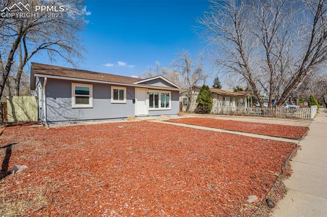 1216 Harrison Road Colorado Springs, CO 80905 - Photo 12 of 15 Front exterior w/off street parking. Plenty of room to build a garage or carport!
