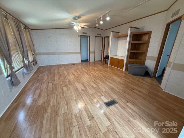 1017 Warlick Road Lawndale, NC 28090 - Photo 14 of 39 a view of empty room with wooden floor and fan