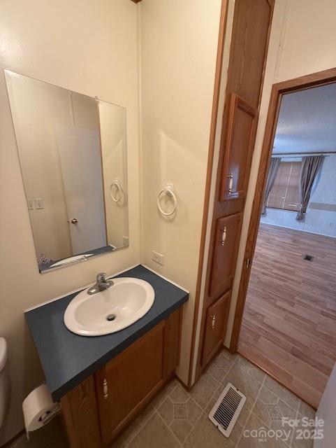 1017 Warlick Road Lawndale, NC 28090 - Photo 22 of 39 a bathroom with a sink a mirror and a shower
