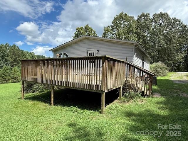 1017 Warlick Road Lawndale, NC 28090 - Photo 34 of 39 a view of backyard with deck and garden