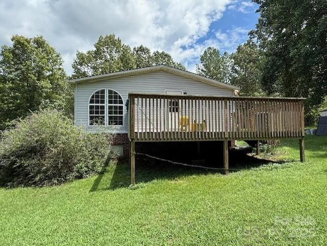 1017 Warlick Road Lawndale, NC 28090 - Photo 35 of 39 a view of backyard with a garden and deck