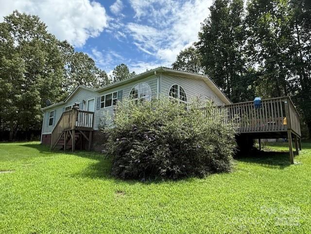 1017 Warlick Road Lawndale, NC 28090 - Photo 36 of 39 a front view of a house with a garden