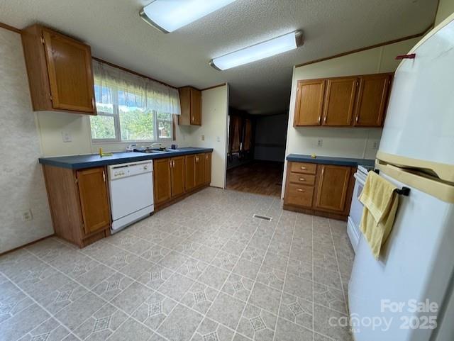 1017 Warlick Road Lawndale, NC 28090 - Photo 5 of 39 a kitchen with stainless steel appliances granite countertop a sink a stove top oven a refrigerator and dishwasher
