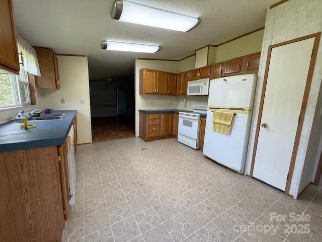 1017 Warlick Road Lawndale, NC 28090 - Photo 6 of 39 a kitchen with refrigerator and cabinets