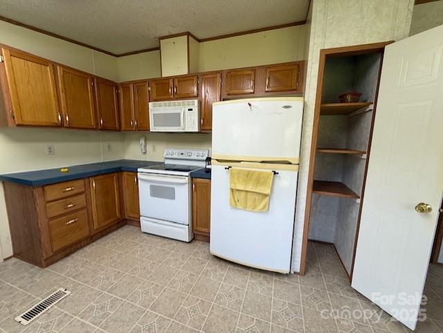 1017 Warlick Road Lawndale, NC 28090 - Photo 7 of 39 a utility room with cabinets washer and dryer