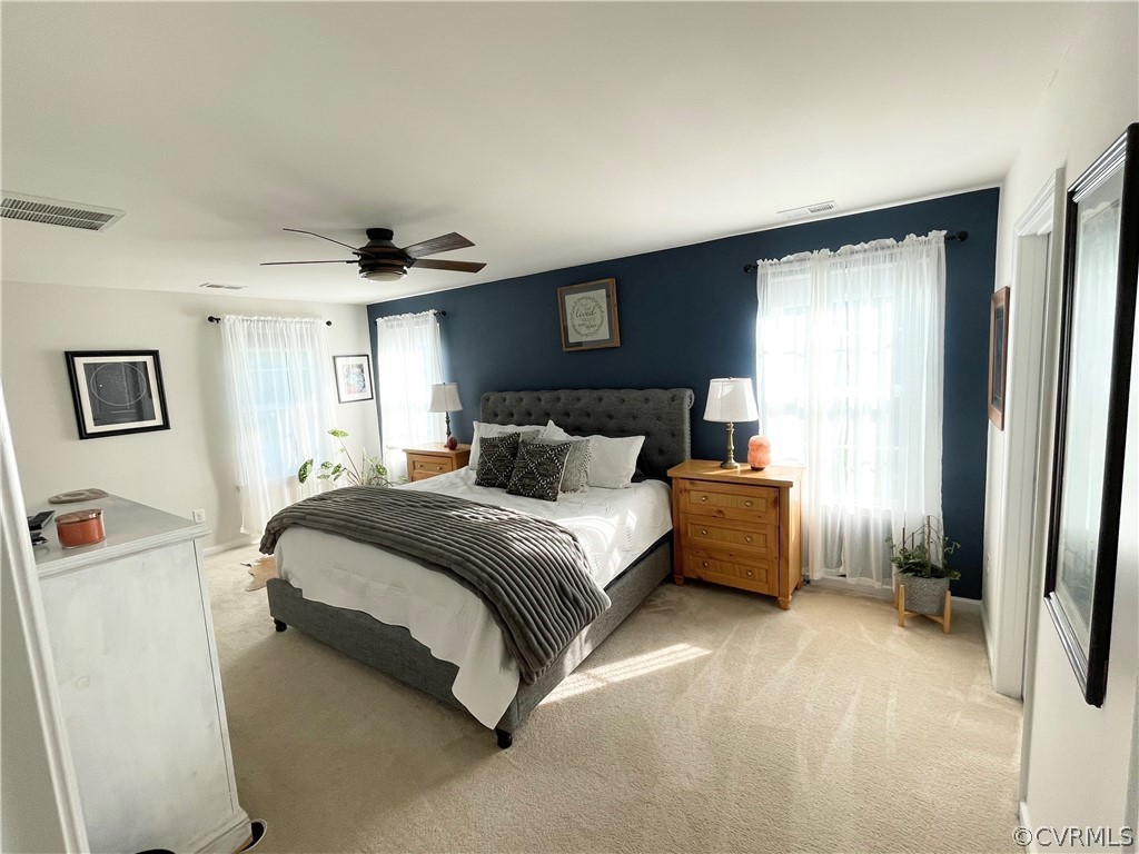 10219 Sandy Ridge Drive Chesterfield, VA 23832 - Photo 17 of 28 a bedroom with a bed and a cabinets