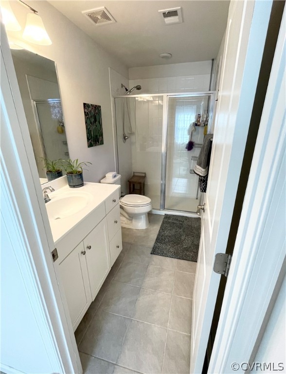10219 Sandy Ridge Drive Chesterfield, VA 23832 - Photo 18 of 28 a bathroom with a double vanity sink toilet and shower