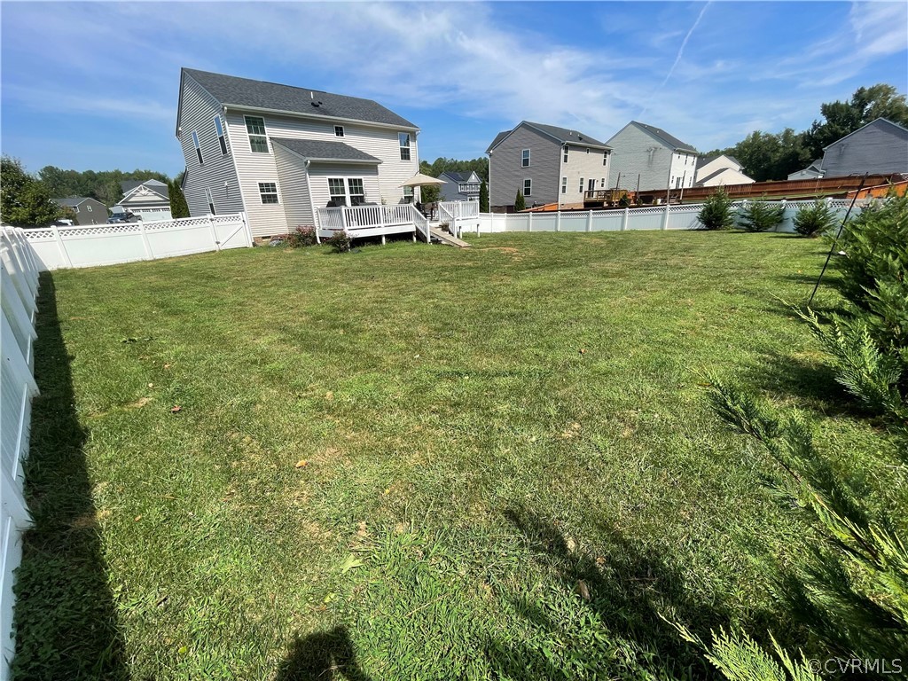 10219 Sandy Ridge Drive Chesterfield, VA 23832 - Photo 25 of 28 a house with a yard in front of it