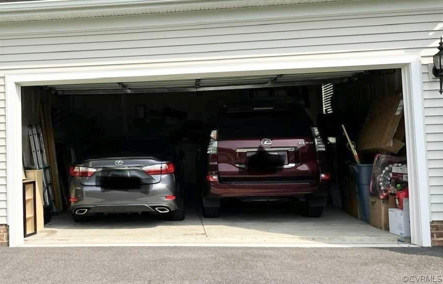 10219 Sandy Ridge Drive Chesterfield, VA 23832 - Photo 28 of 28 a view of car parked in garage