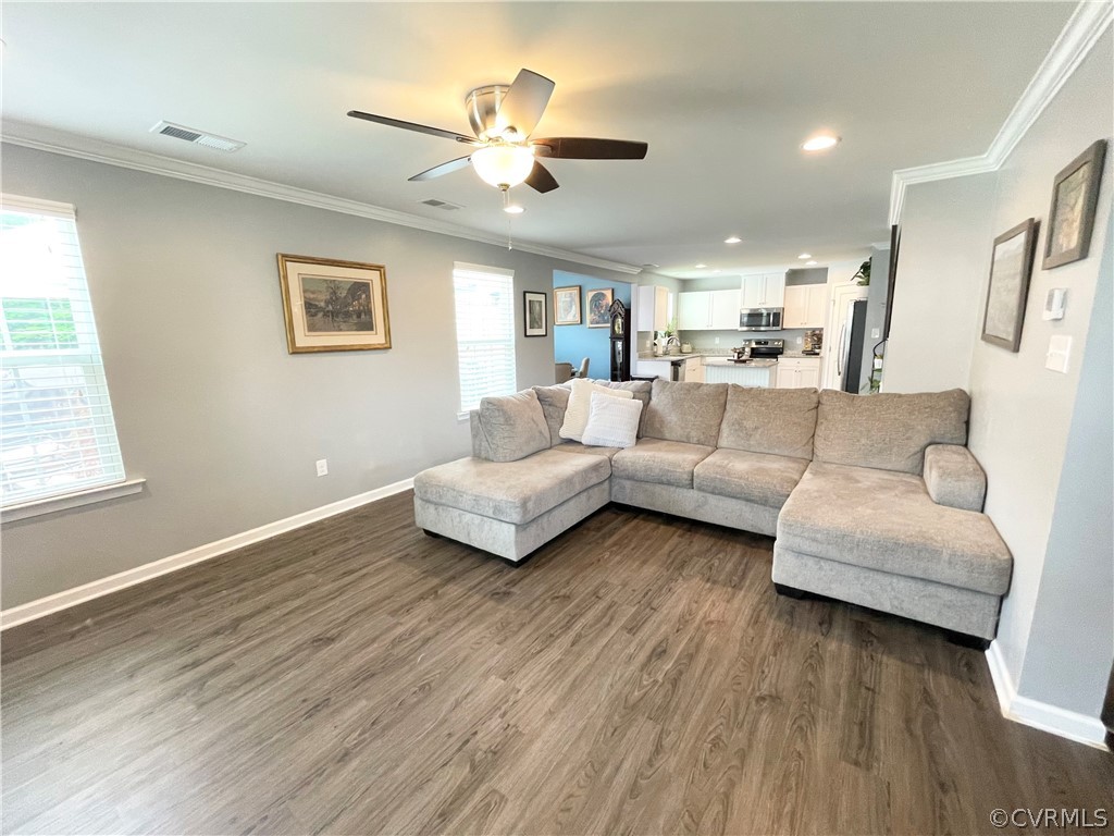 10219 Sandy Ridge Drive Chesterfield, VA 23832 - Photo 4 of 28 a living room with furniture and a wooden floor
