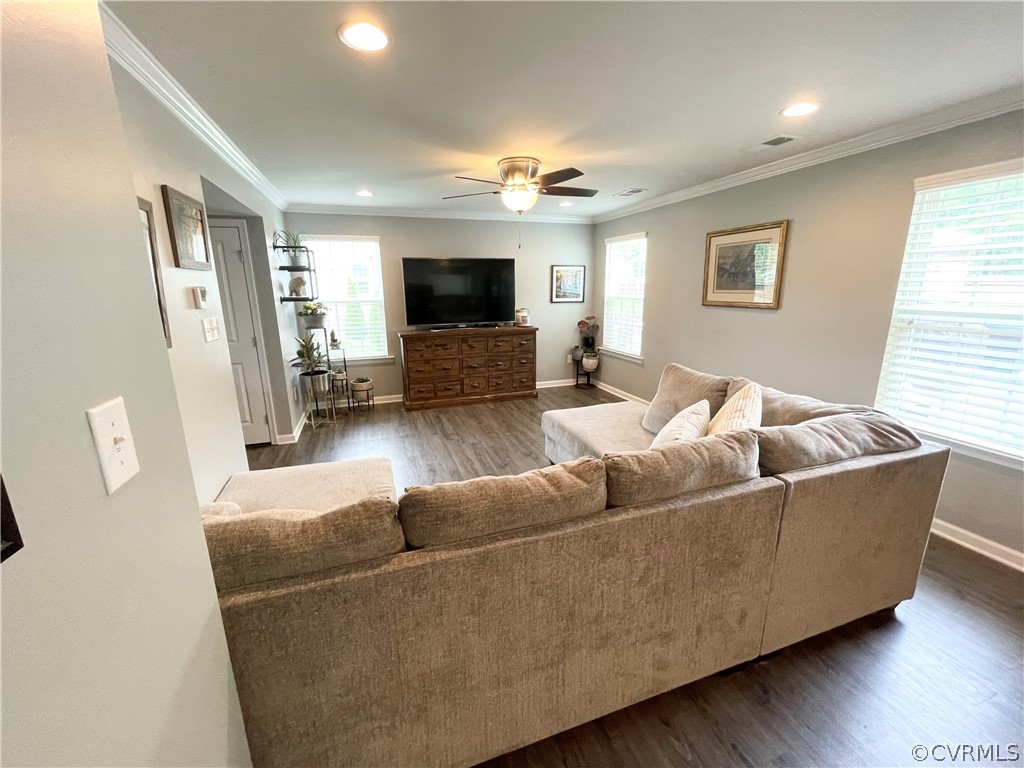 10219 Sandy Ridge Drive Chesterfield, VA 23832 - Photo 5 of 28 a living room with furniture and a flat screen tv