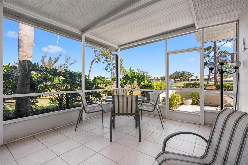 270 Cerromar Way South, Unit 57 Venice, FL 34293 - Photo 30 of 81 a outdoor living space with furniture and garden view
