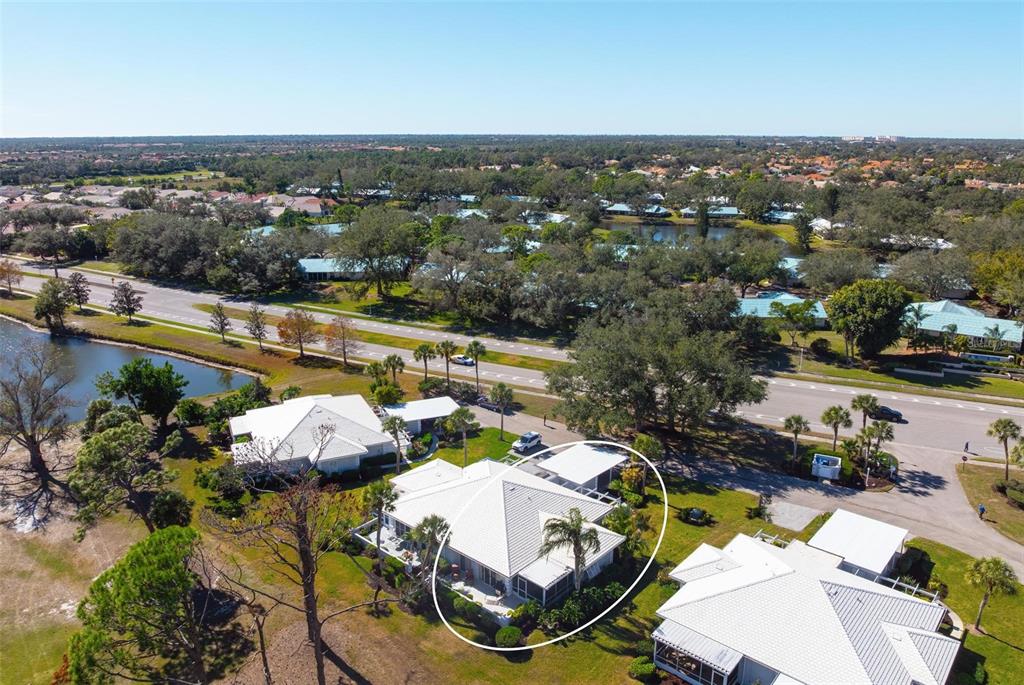 270 Cerromar Way South, Unit 57 Venice, FL 34293 - Photo 68 of 81 an aerial view of a house with a swimming pool
