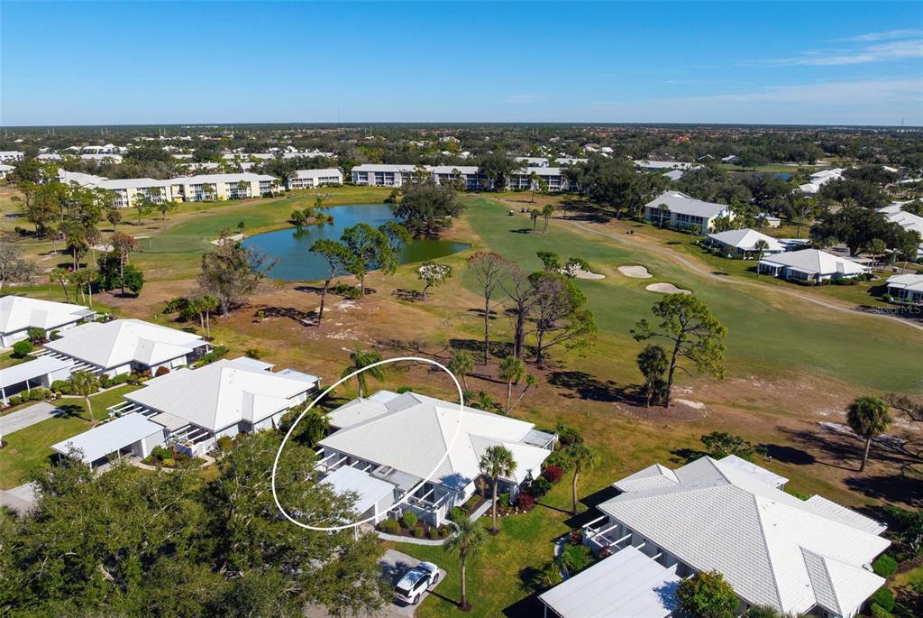270 Cerromar Way South, Unit 57 Venice, FL 34293 - Photo 71 of 81 an aerial view of residential houses with outdoor space