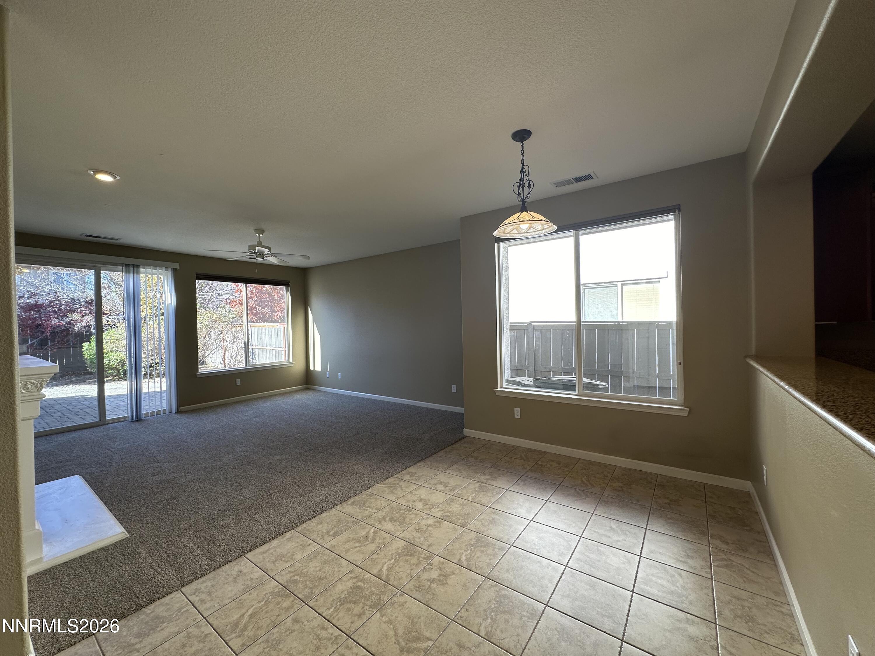 13755 Seabiscuit Drive Reno, NV 89521 - Photo 8 of 19 a view of an empty room with a window
