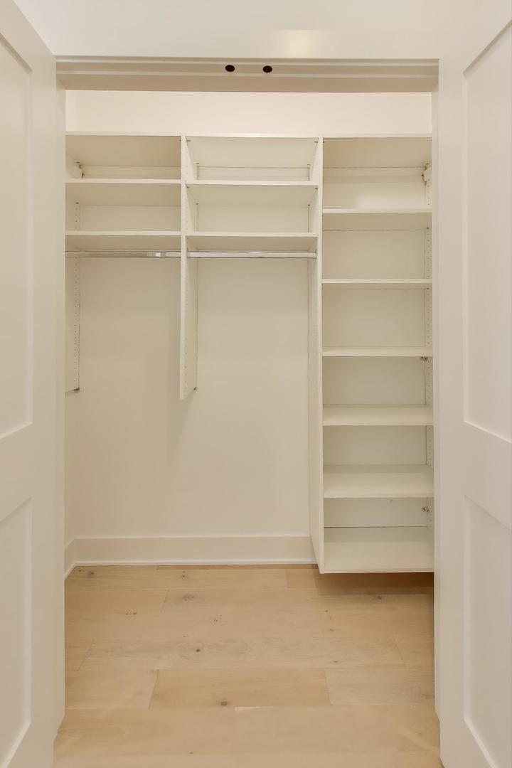 1619 West Lawrence Avenue, Unit 2 Chicago, IL 60640 - Photo 15 of 19 a view of an empty walk in closet