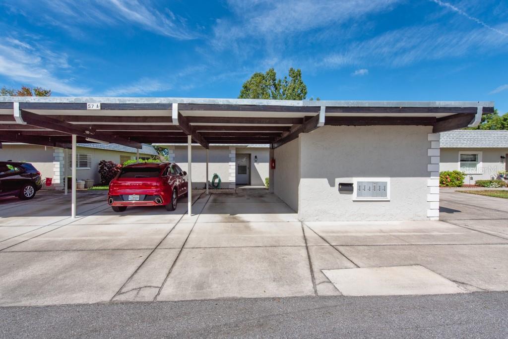 a view of parking garage with cars