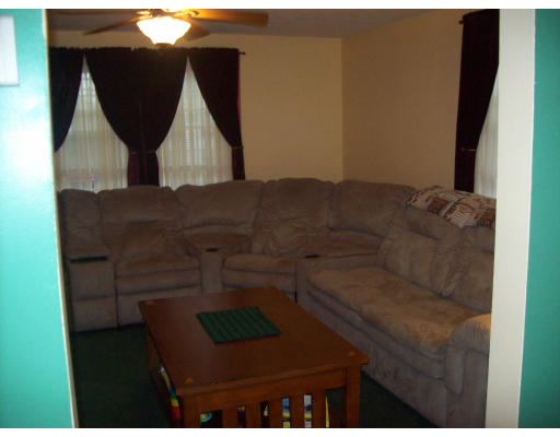 8 Pine Street, Unit 1 Peabody, MA 01960 - Photo 5 of 7 a bathroom with a sink and mirror