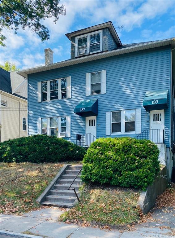 187 Whitney Street, Unit A2 Hartford, CT 06105 - Photo 1 of 1 a front view of a house with garden