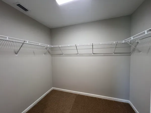 a view of a room with racks on the wall