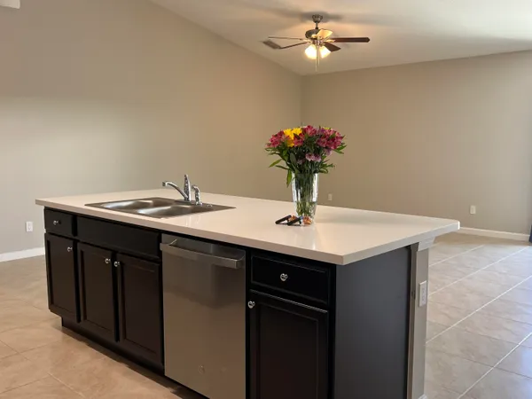 a sink with a chandelier