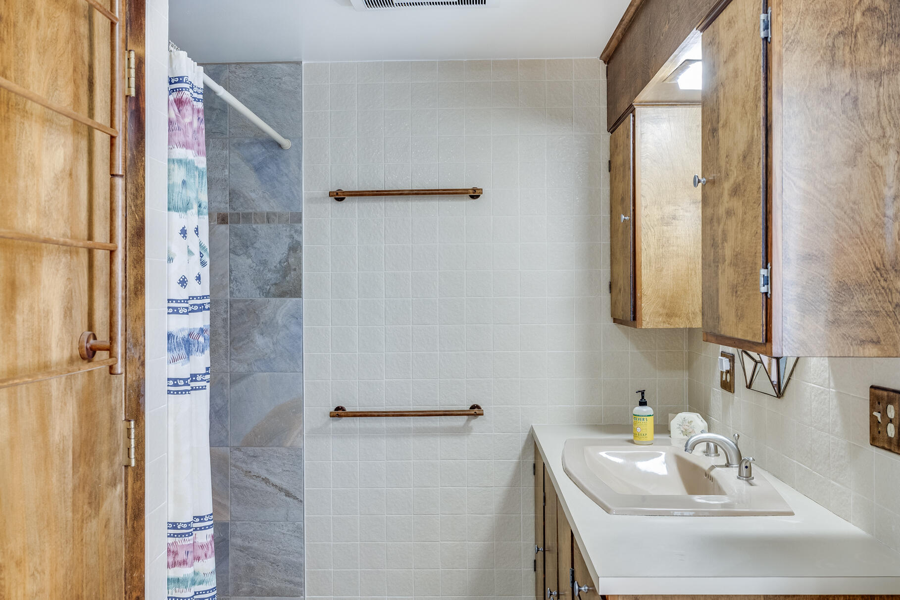 72 South Highland Road Truro, MA 02666 - Photo 22 of 59 a bathroom with a sink and a mirror