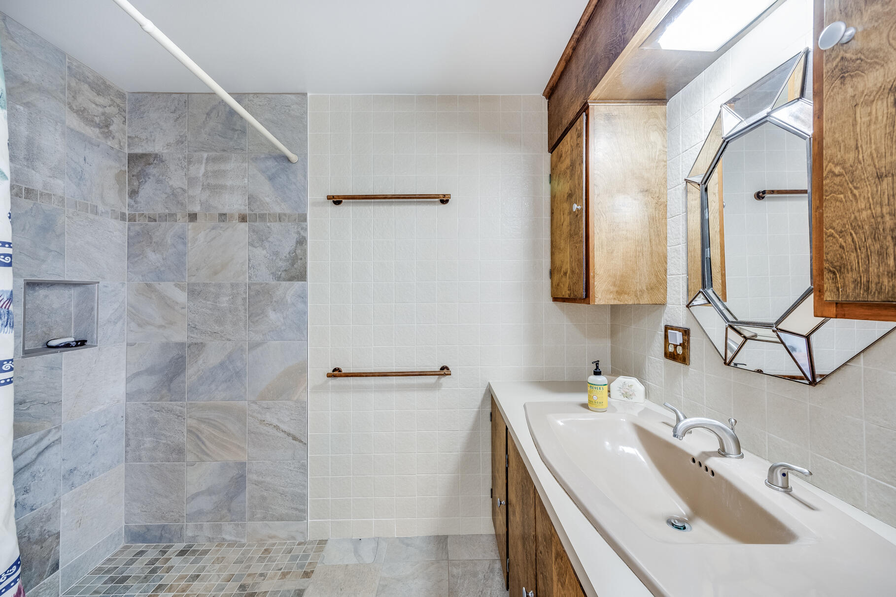 72 South Highland Road Truro, MA 02666 - Photo 23 of 59 a bathroom with a sink a toilet and mirror
