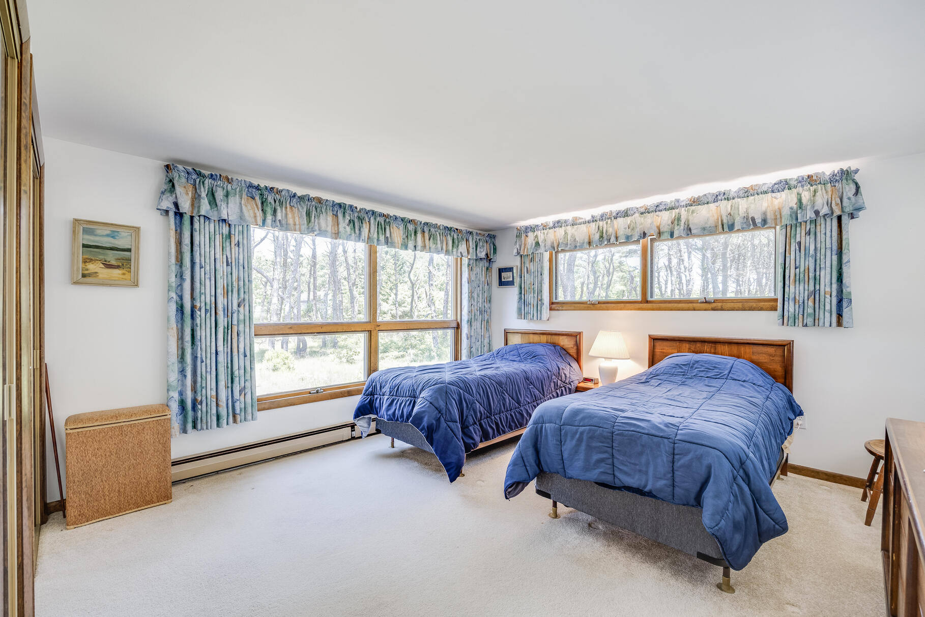 72 South Highland Road Truro, MA 02666 - Photo 24 of 59 a living room with two bed and a large window