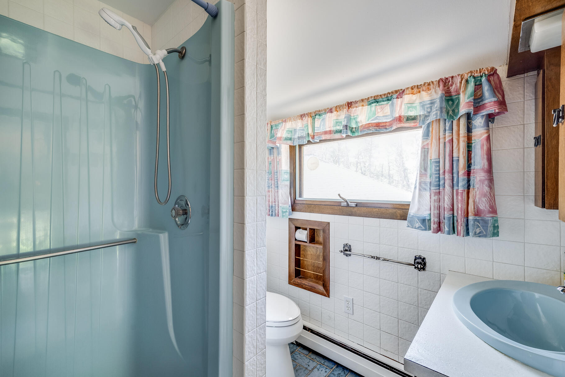 72 South Highland Road Truro, MA 02666 - Photo 28 of 59 a bathroom with a sink a toilet a window and shower
