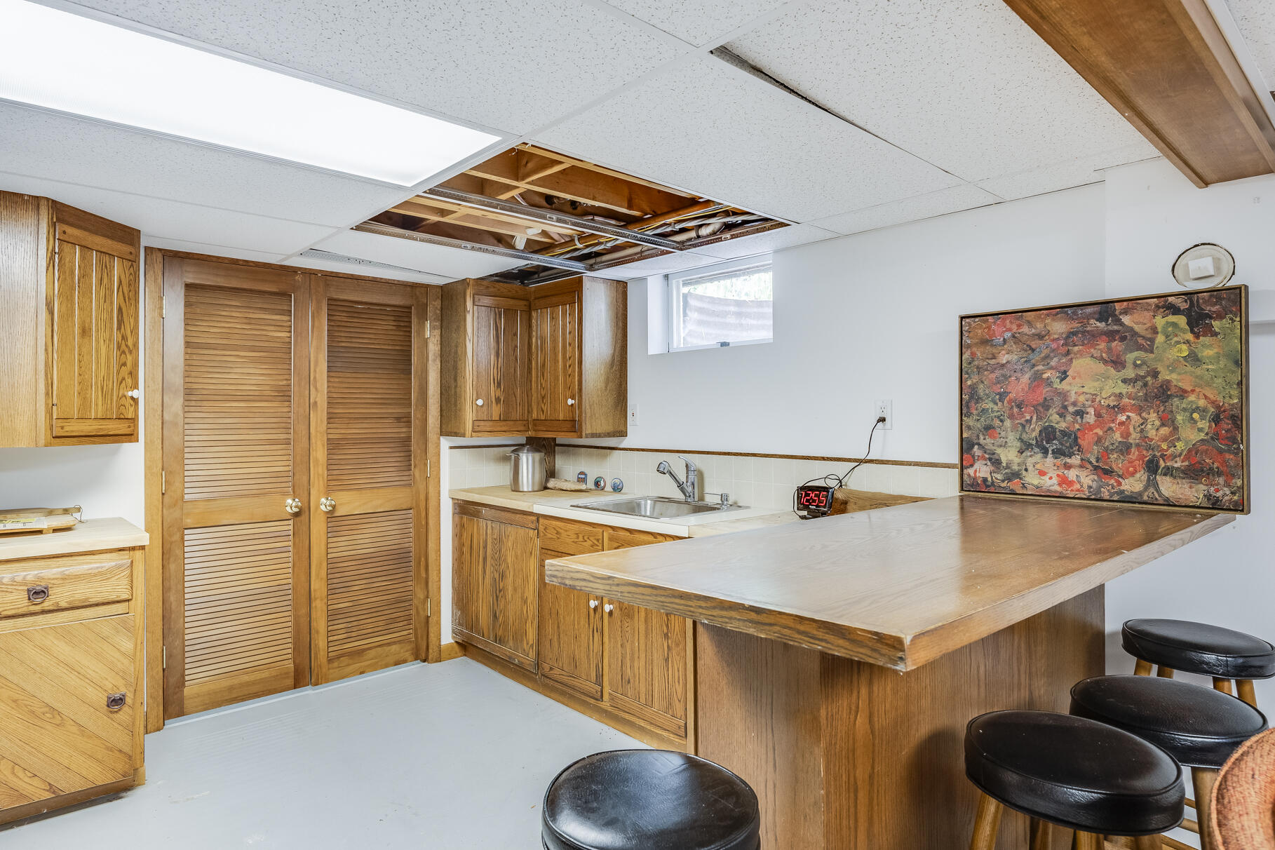 72 South Highland Road Truro, MA 02666 - Photo 32 of 59 a kitchen with a sink and cabinets